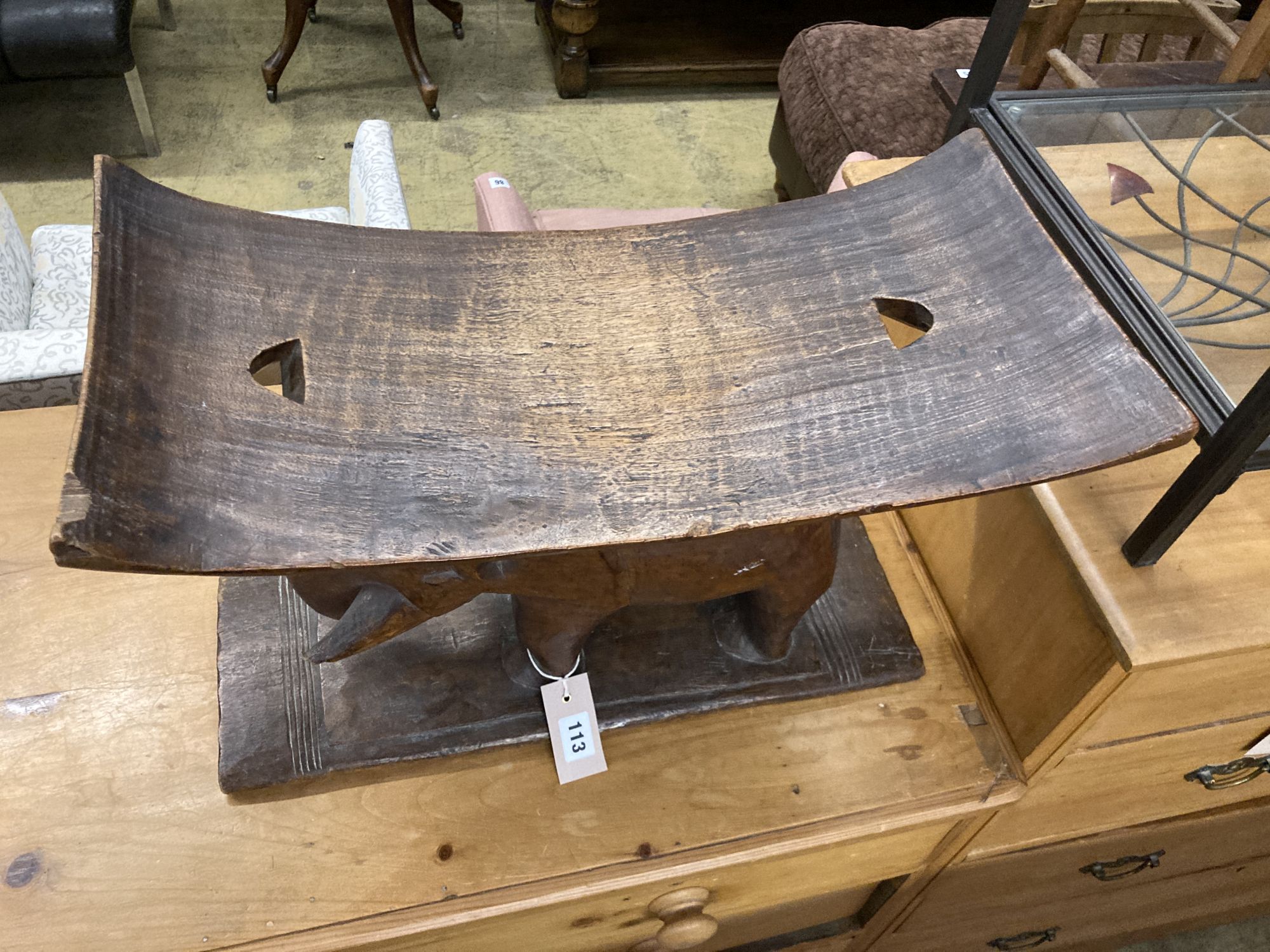 An African carved elephant ashanti stool, width 52cm, depth 26cm, height 35cm